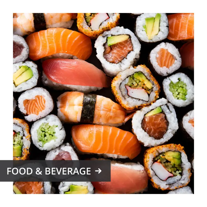 Vacaville-Homepage-Squares-Food-min Assorted sushi rolls and nigiri arranged on a dark platter; graphic reads “Food & Beverage.”